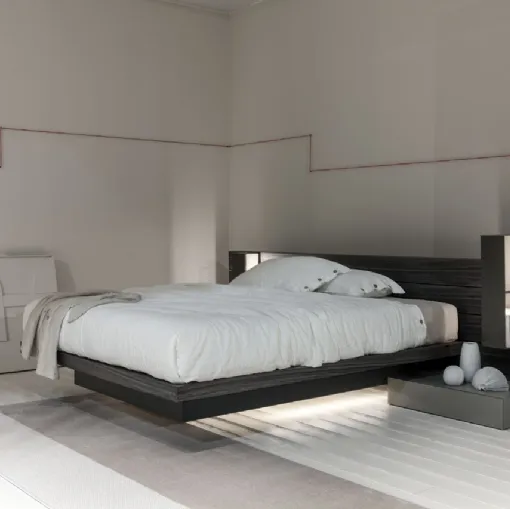 Letto in legno con box contenitore sollevato da terra con testiera autoportante Sestante di Fimar
